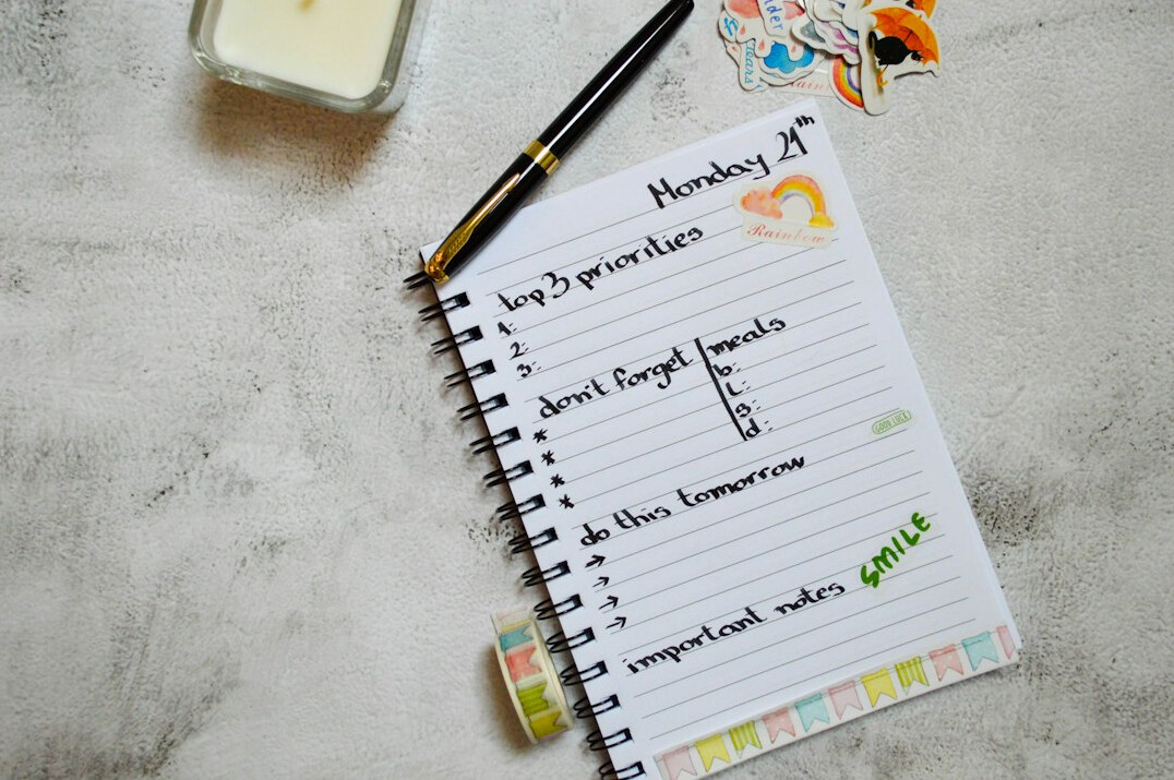 person reviewing budget notebook