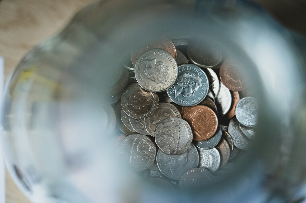 savings jar with coins