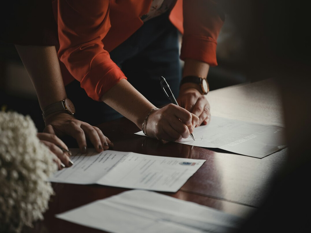 person reviewing loan documents